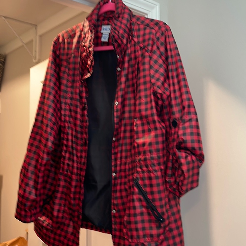 Red and black checked rain jacket